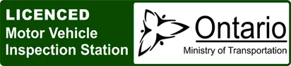 The Mufflerman, Mechanic Near Me Green and white sign reading Licensed Motor Vehicle Inspection Station with the Ontario Ministry of Transportation logo, featuring a stylized trillium flower. Find a vehicle safety inspection near me for reliable and certified service.